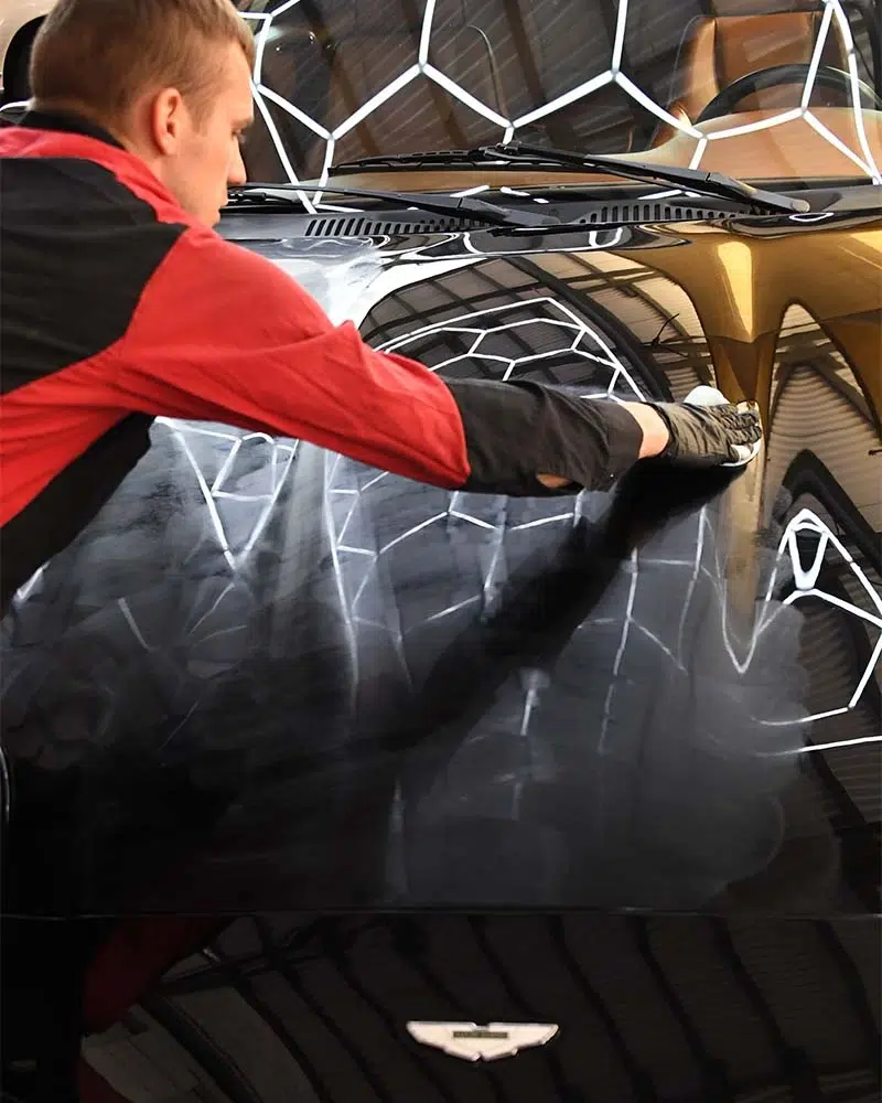 Technician applying ceramic coating