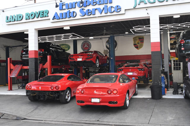 Ferrari 360 Modena and Ferrari 550 Maranello parked outside European Auto Service in Reseda with additional Ferraris on lifts inside the shop