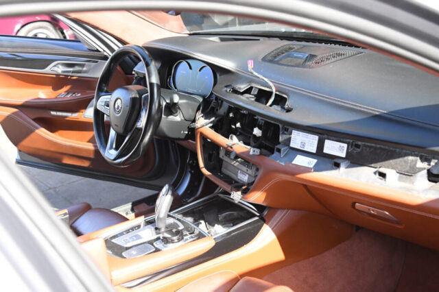 Exposed wiring and dash components of Alpina B7 being serviced in Reseda Electrical diagnostics and dashboard disassembly of Alpina B7 at European Auto Service, Reseda
