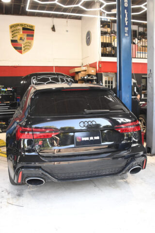Audi RS6 in Reseda Shop Bay at European Auto Service LA Rear view of Audi RS6 parked inside the workshop for diagnostics in Reseda, Los Angeles