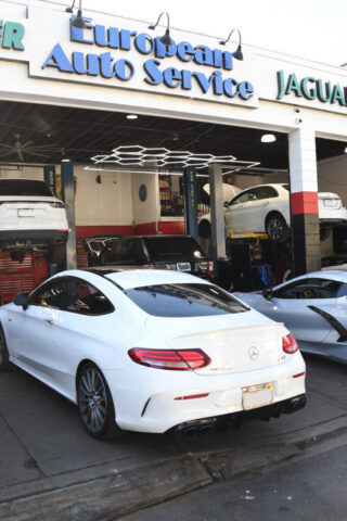 Mercedes-Benz C43 AMG at European Auto Service White Mercedes C43 AMG parked outside European Auto Service shop in Reseda