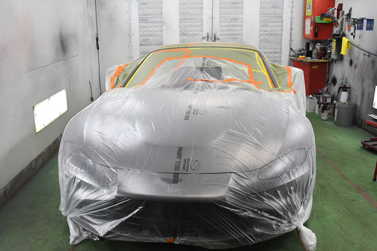 Aston Martin Vantage fully masked and prepared for paint in the licensed spray booth at European Auto Service in Reseda