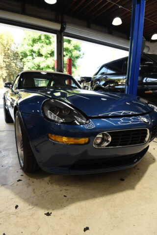 Blue BMW Z8 classic roadster inside European Auto Service bay in Los Angeles, showcasing iconic front-end design and chrome kidney grille