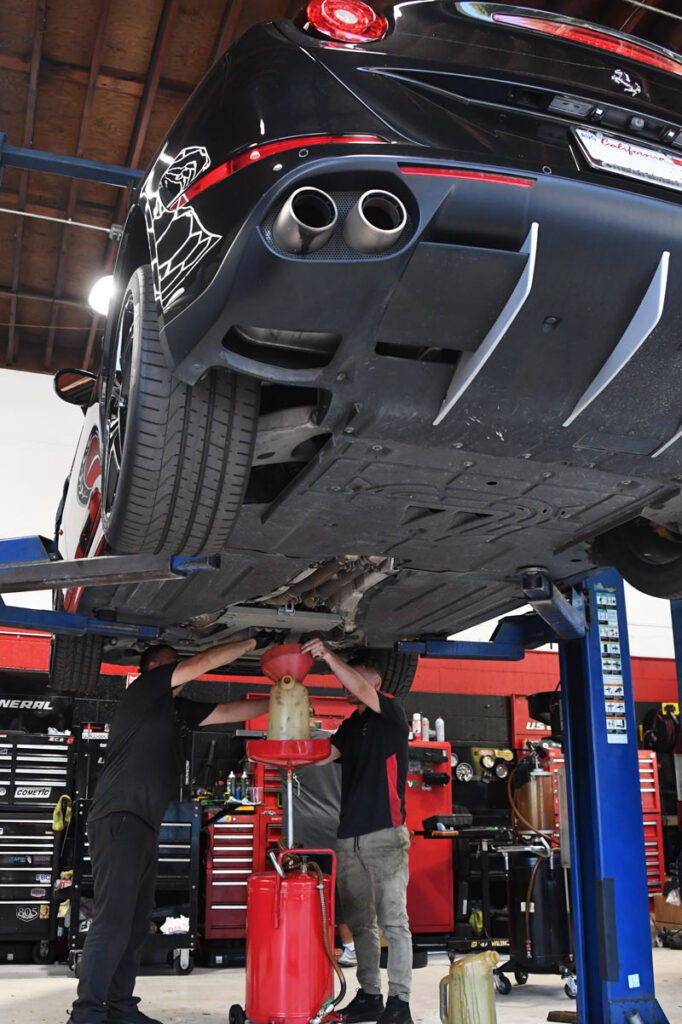 Underbody inspection and fluid service during routine vehicle maintenance