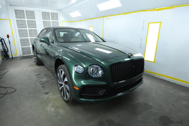 Bentley Flying Spur in paint booth after refinishing Bentley Flying Spur in our paint booth after color-matched green refinishing