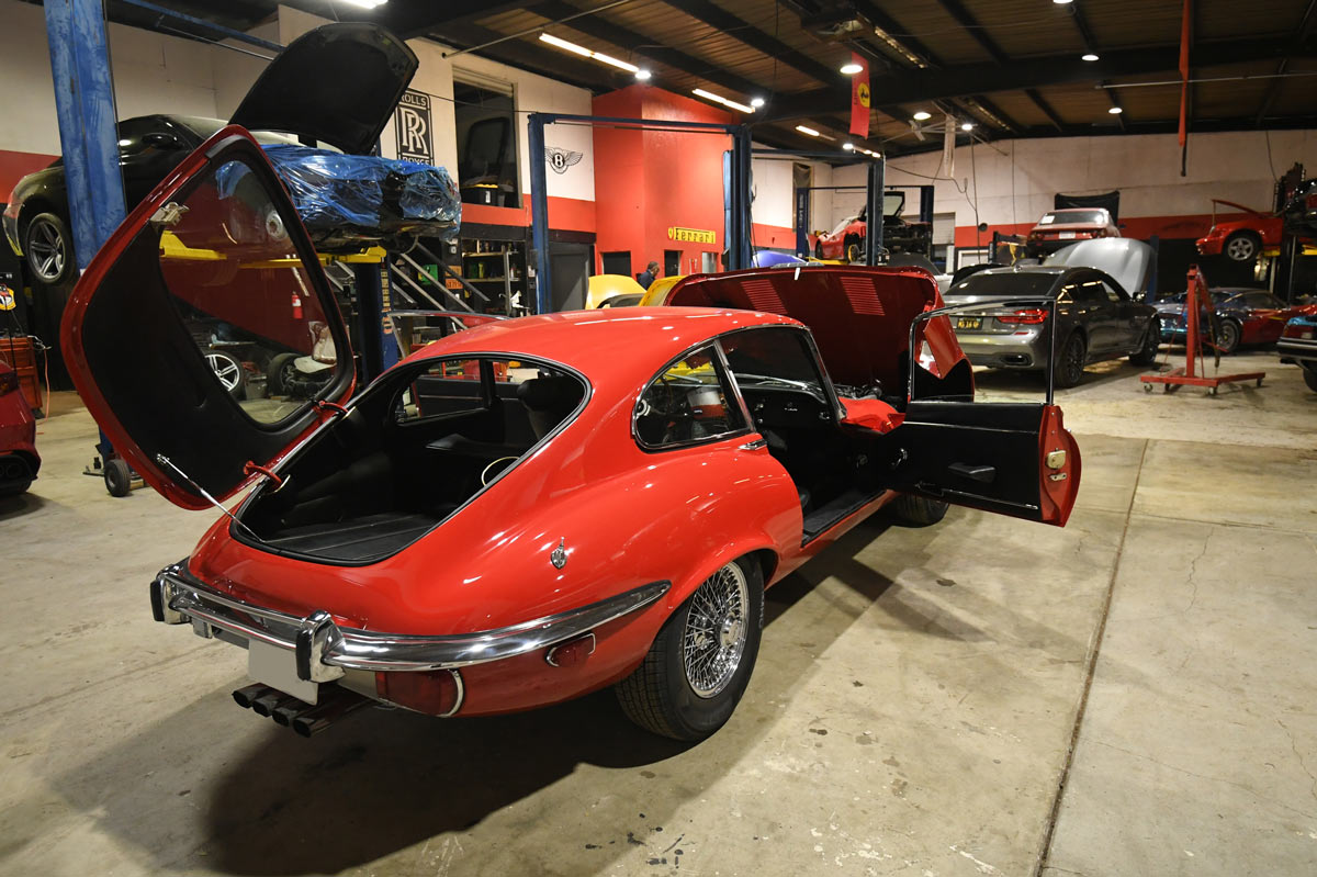 Jaguar E-Type opened for component access in our Reseda workshop