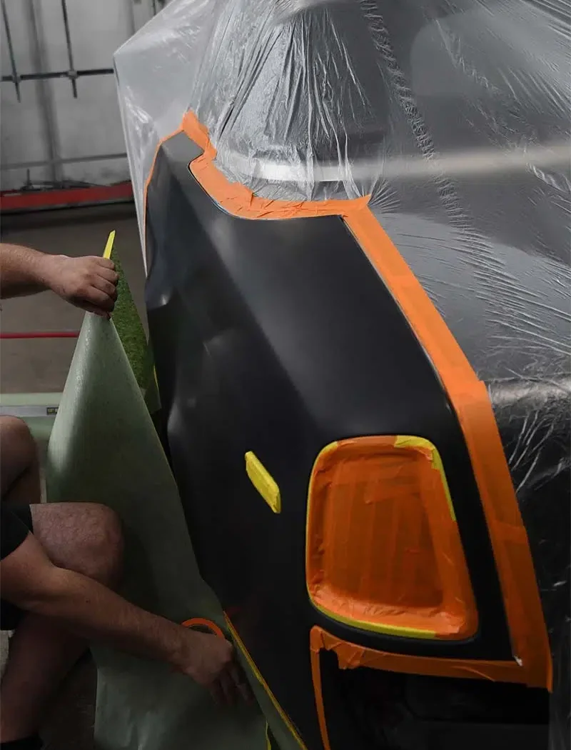 Painting a car in Reseda