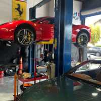 Ferrari on garage hoist